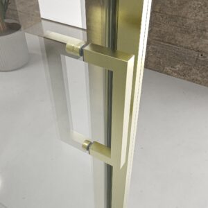 Mampara de ducha NOVUM rectangular 1 fijo - 1 puerta corredera + 1 fijo vidrio 6 mm.  transparente ACERO INOXIDABLE Oro mate