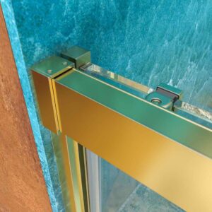 Mampara de ducha frontal BASIC 1 fijo -1 puerta corredera. Sin perfil inferior. Con tratamiento anti-cal . Acabado ORO MATE